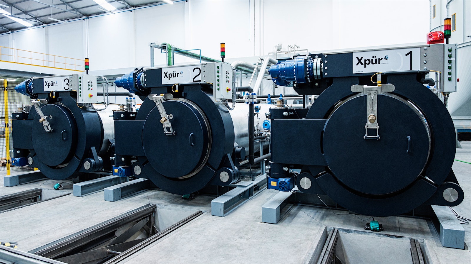 A row of machines used in manufacturing the Amorim XPur closures.